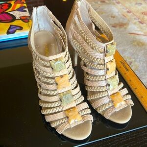 4 inches tall BCBG sandals. Glamorous Got tons of compliments when wearing them.